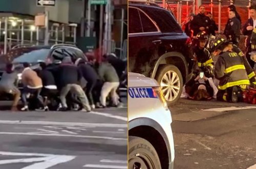 Maşını qaldıraraq, qadını belə çıxardılar - VİDEO