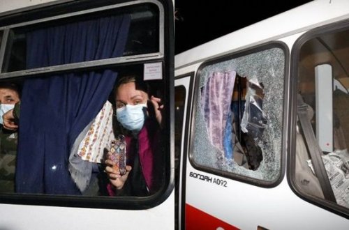 Çindən təxliyyə olunan ukraynalıların avtobusu daşa basıldı - VİDEO