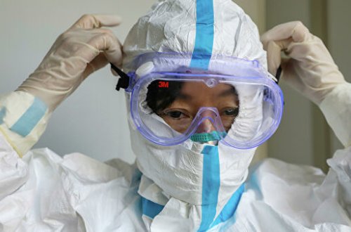 Koronavirus səbəbindən çinli həkimlərin dərisi qaralıb