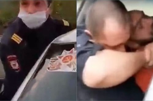 Rusiyada polis xidməti maşında şübhəlini boğmağa cəhd etdi - VİDEO
