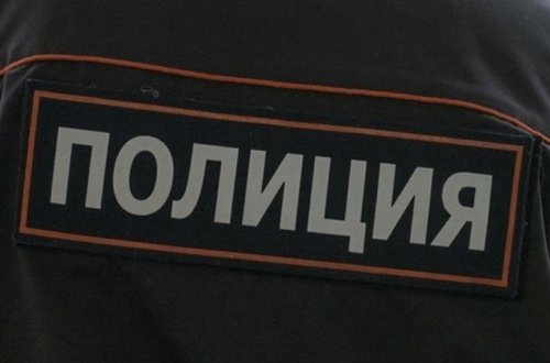 Maskasız rus qadın bazarda polis işçisini dişlədi