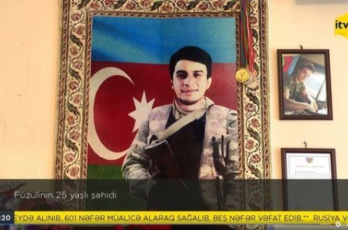 Семья шехида собралась у его могилы в день рождения героя - ВИДЕО