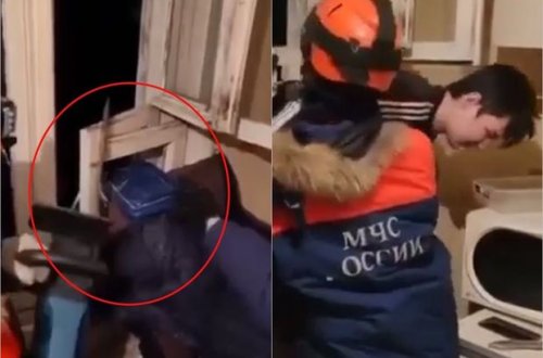 Rusiyada gülünc oğurluq cəhdi: Oğru pəncərə nəfəsliyində ilişib qaldı - VİDEO