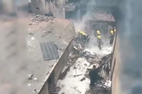 Çində təyyarə evlərin üzərinə düşüb: Ölənlər var