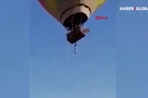 Hava şarının səbətindən asılı qalan kişinin həyatda qalma mübarizəsi - VİDEO