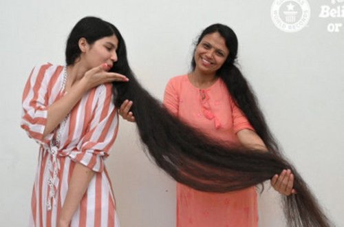 Девушка с самыми длинными в мире волосами коротко подстриглась - ФОТО