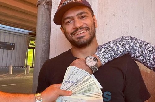 Швырявшего доллары спортсмена исключили из сборной - ВИДЕО