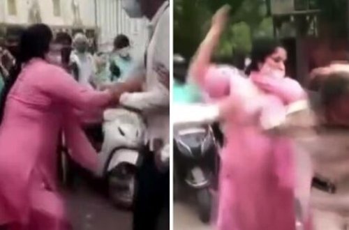 Qadınlar maska taxmadığı üçün onlara cərimə yazan polisi döydülər - VİDEO