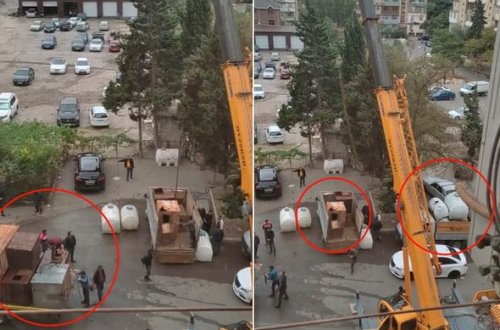 Bakıda binaların üstündəki çənlər yenidən yığışdırılır - VİDEO