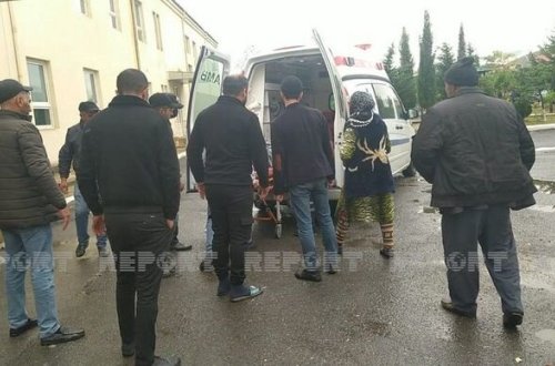 Oğuzda 66 yaşlı qadın boğazını kəsdi