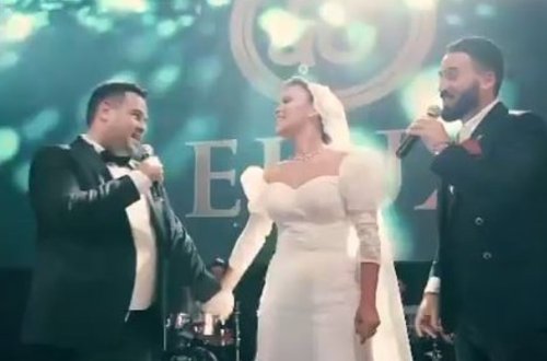Həyat yoldaşı Sevda üçün toyda mahnı oxudu - Video