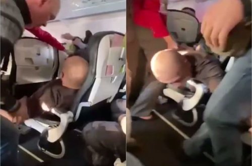 Təyyarə səmada olarkən sərnişinlər arasında dava düşdü - VİDEO