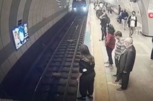 Özünü qatarın altına atan qadın sağ qaldı – ANBAAN VİDEO