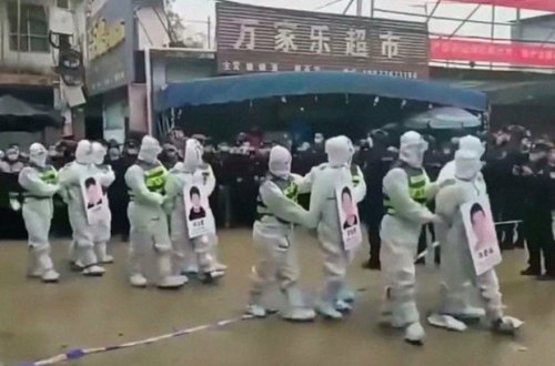 Çində karantin qaydalarını pozanlara qəribə cəza - VİDEO