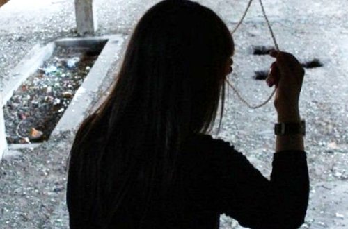 Həyat yoldaşı koronavirusdan ölən qadın intihar etdi