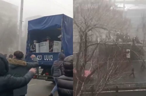 Qazaxıstanda nümayişçilər polisin texnikasını ələ keçirib hökumət binasına doğru hərəkət edir - VİDEO
