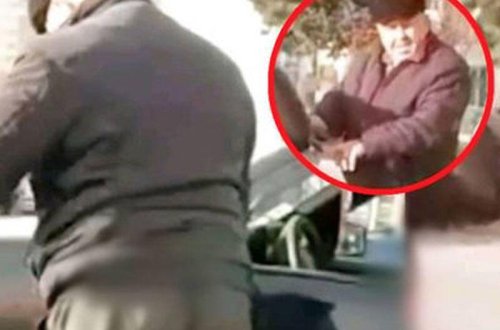 Azərbaycanda taksi sürücüsündən təhqiramiz hərəkət: Maşınını bayrağımızla sildi - YENİLƏNİB + VİDEO