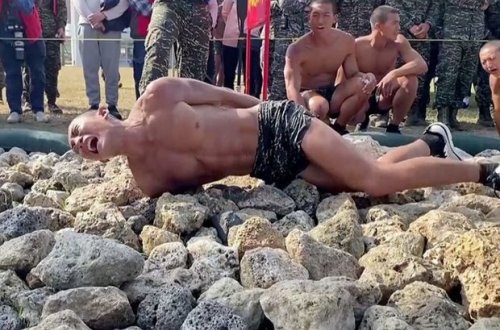 Острые камни и несколько минут на сон: на Тайване готовят подводную армию - ВИДЕО