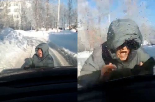 “Oskar”lıq performans: Özünü hərəkət etməyən avtomobilin altına atdı - VİDEO