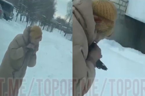 Rusiyada yaşlı qadın küçənin ortasında göyərçini parçalayıb yedi - VİDEO