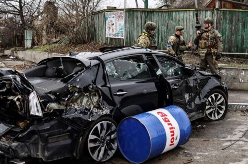 Yüzlərlə insanın qətlə yetirildiyi Buçadan dəhşətli görüntülər (FOTOLAR)