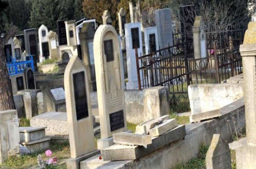Polis zabiti qəbiristanlıqda İNTİHAR ETDİ