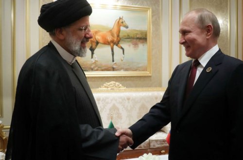 Putin Rəisi ilə görüşüb