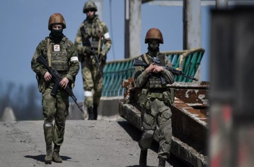 Rusiya Xerson şəhərindən çıxardığı hərbçi və texnika sayını açıqlayıb