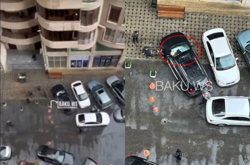 Bakıda gənc oğlan 15-ci mərtəbədən maşının üstünə düşdü - VİDEO