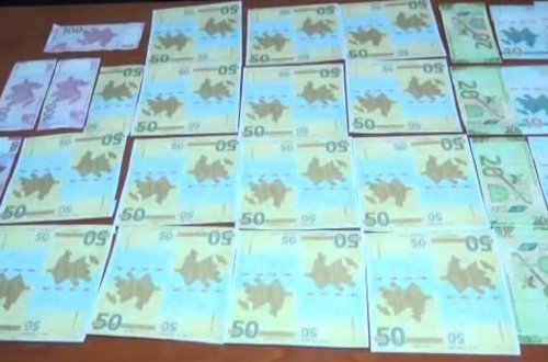 Fotostudiyada saxta pul kəsənlər saxlanıldı - FOTO