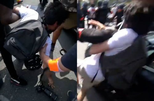 Fransa polisi fotoqrafı döyüb kamerasını sındırdı - VİDEO