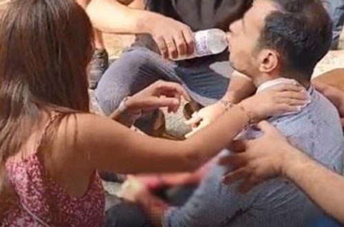 Hər kəsin gözü qarşısında qızının sevgilisinin boğazını kəsdi - VİDEO - FOTO