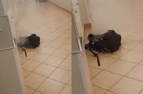 Rusiyada məktəblinin bel çantasında olan mobil telefon partlayıb - VİDEO