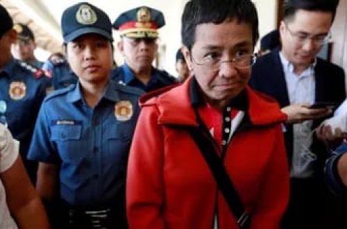 Nobel mükafatı laureatı jurnalist bəraət qazandı