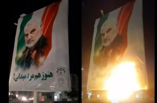 İranda Qasım Süleymaninin banneri yandırıldı - VİDEO