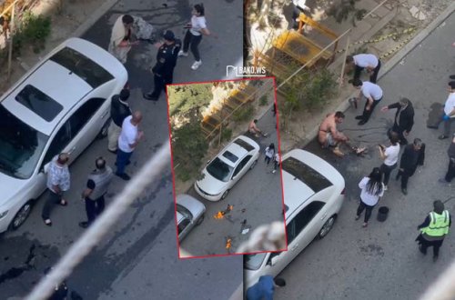 Bakıda kişi sevdiyi qıza görə küçədə özünə OD VURDU - VİDEO