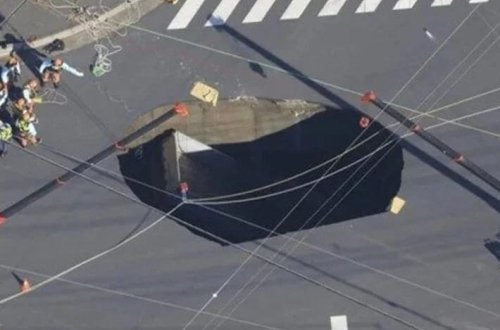 Yaponiyada xəndəyə düşən sürücünün xilasetmə işləri davam edir