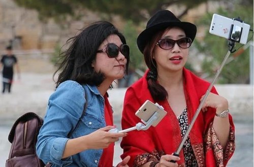 Çin öz vətəndaşlarına ABŞ-a səyahətlə bağlı xəbərdarlıq edib