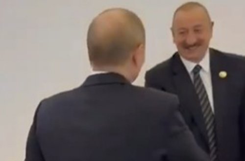 İlham Əliyevlə Putinin salamlaşma anı - Video