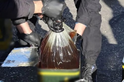 Qaçaqmalçıların maye kokaini yağ qutularında tutuldu