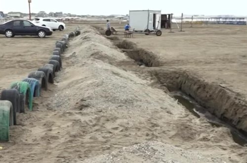 Novxanı çimərliyində xəndəklər qazılıb:Sürücülərin yolu kəsilib