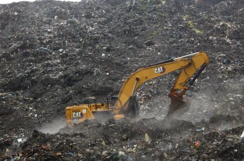 Zibil yığını evləri basdı: Tonlarla tullantı altında 30 nəfər həlak oldu
